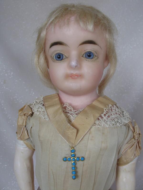 All original German Wax over c1890s child 19.5" (49cm).: All original German Wax over c1890s child 19.5" (49cm). Wax over papier mache shoulder head. Inserted blue glass eyes, angled lashes, lush feathered brows. Nose rub and closed pink mouth with red peak