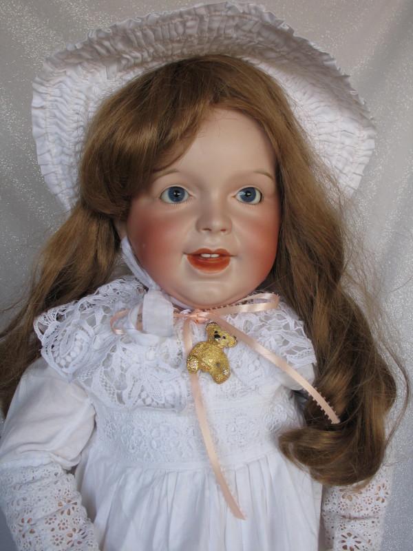 French S.F.B.J. 236 'Laughing Jumeau' Toddler bisque: French S.F.B.J. 236 'Laughing Jumeau' Toddler bisque 27” (68cm). Hairline from back pate rim to ear, short factory flaw at the ear. Scarce red 'Bebe Jumeau' stamp. Open closed mouth with molded 
