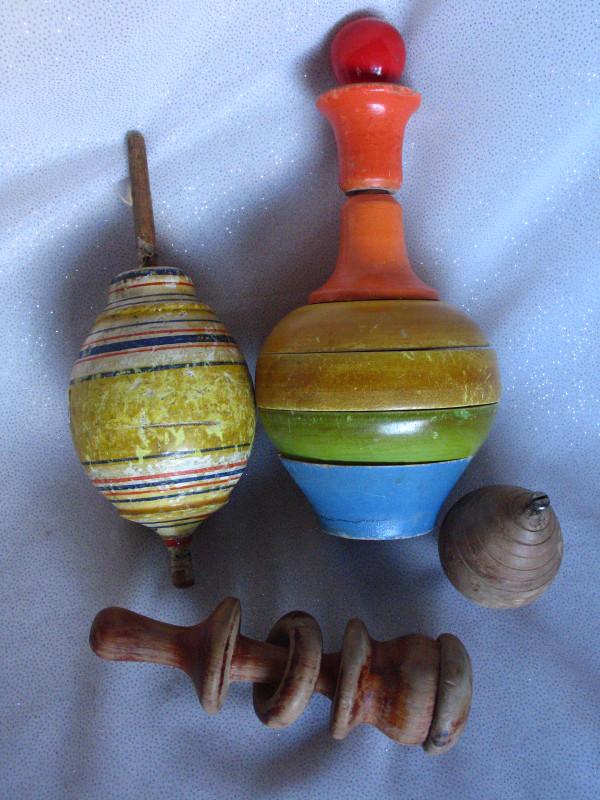 Four vintage wood toys:- Spinning top, rattle, American (1 of 2)