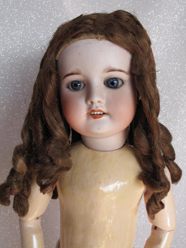 Naked S. F. B. J. 60 child French bisque 19" (48cm).: Naked S. F. B. J. 60 child French bisque 19" (48cm). Blue glass sleep eyes, angled lashes, feathered brows, open accented mouth, upper teeth. Brown curl replaced 40s wig/pate. Composition jointed o/bo