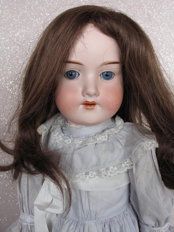 Bisque Armand Marseille 390 bisque 47cm. Blue glass: Bisque Armand Marseille 390 bisque 47cm. Blue glass sleep eyes, faint lashes, feathered brows, open mouth with peak accents, four teeth, back pate rim chip. Ball jointed wood composition repainted bod