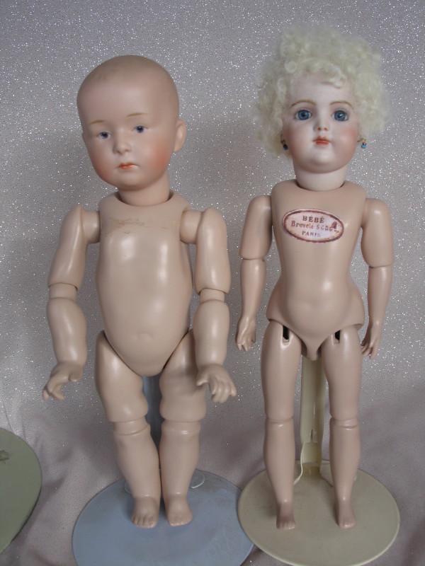 Two cabinet reproduction porcelain naked dolls:- Bru (1 of 3)