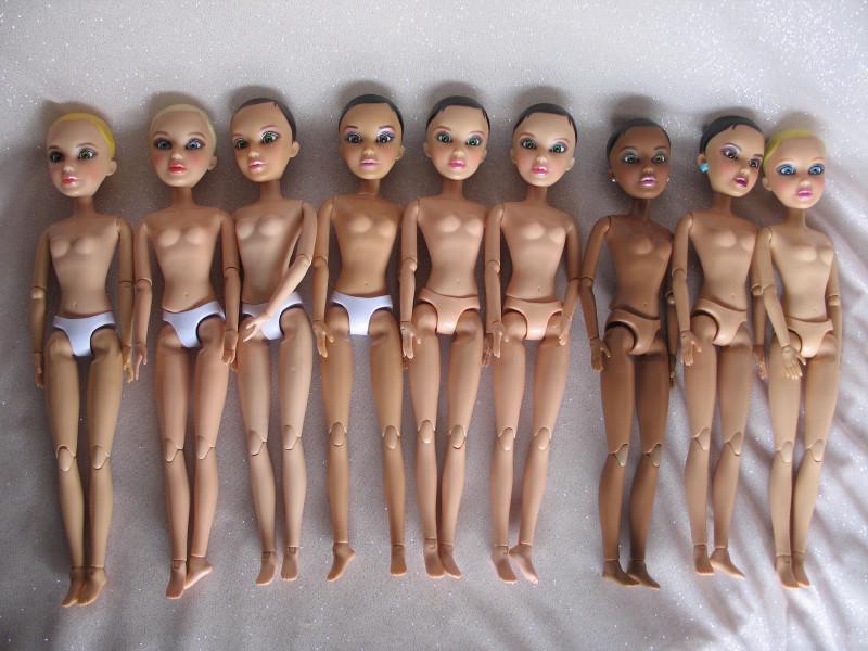 Nine Spin Master Liv dolls, come with outfits and wigs: Nine Spin Master Liv dolls, come with outfits and wigs in plastic bags.