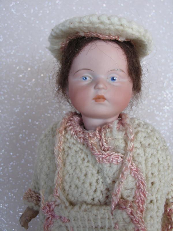 Round face Armand Marseille 'Pouty' 10" (25cm) c1910s (1 of 2)