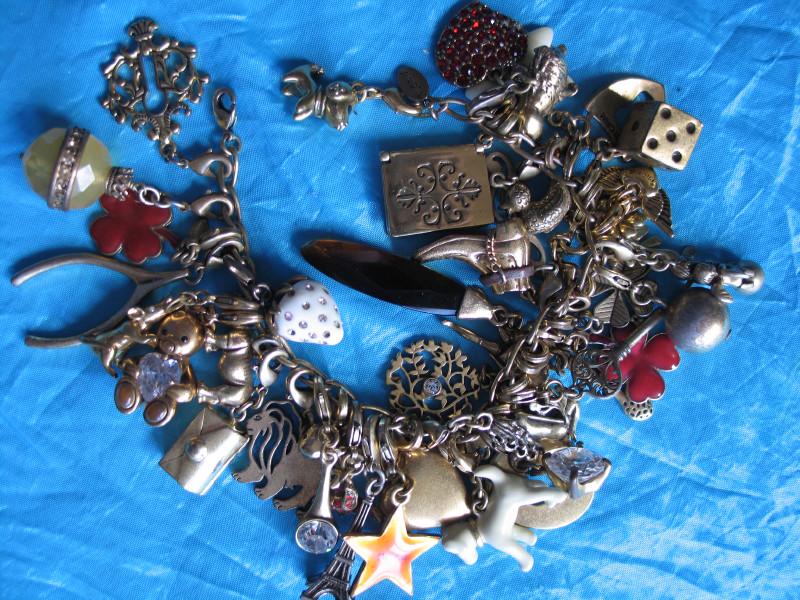 Gold 14K plated Denmark Pilgrim Charm Bracelet with a: Gold 14K plated Denmark Pilgrim Charm Bracelet with a great array of forty-two 42 lovely charms .