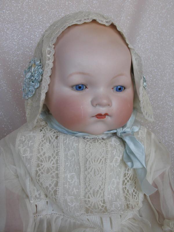 Bisque Armand Marseille 341 Baby 21" (53cm) swivel head: Bisque Armand Marseille 341 Baby 21" (53cm) swivel head . Blue glass sleep eyes, angled lashes, closed red mouth, cheek rubs soft blush . Pink cotton kapok fill swivel jointed body with composition sw