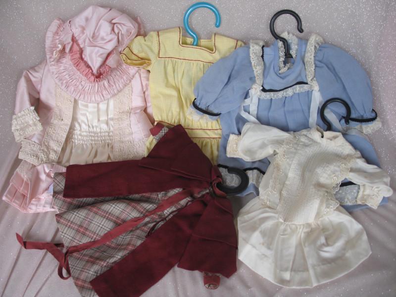 Ten Doll Dresses 25cm to 33cm long cotton and lace trim: Ten Doll Dresses 25cm to 33cm long cotton and lace trim and various colours .