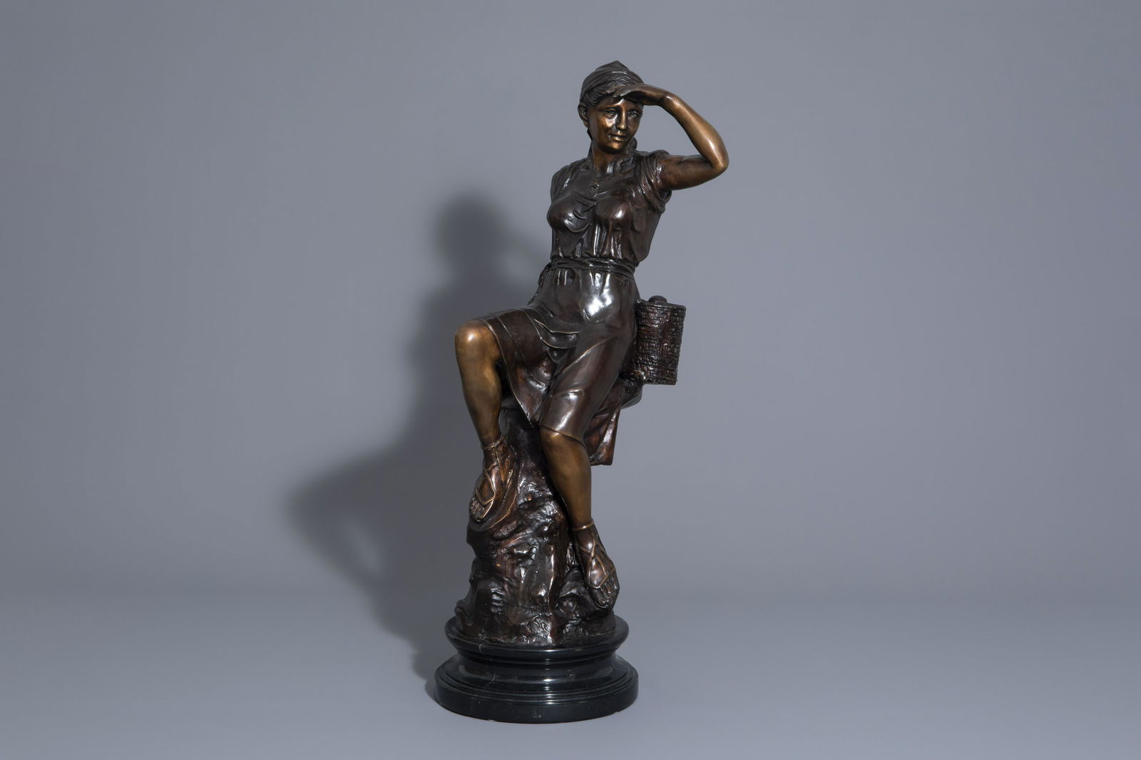 In the manner of Hippolyte Moreau (1832-1927): Resting: In the manner of Hippolyte Moreau (1832-1927): Resting young lady, patinated bronze on a black marble base Â H 86 - 76,5 cm (with and without the base)Â Illegibly signed and with a later 'H. More
