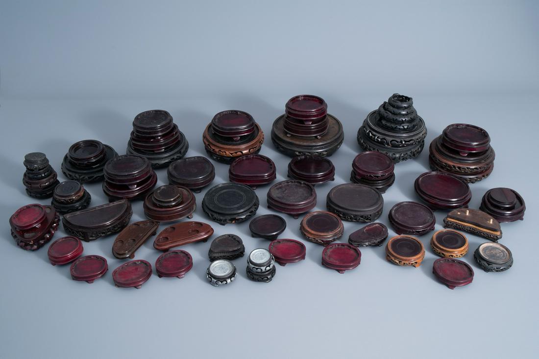 A collection of Chinese carved wooden stands, 19th/20th (1 of 13)