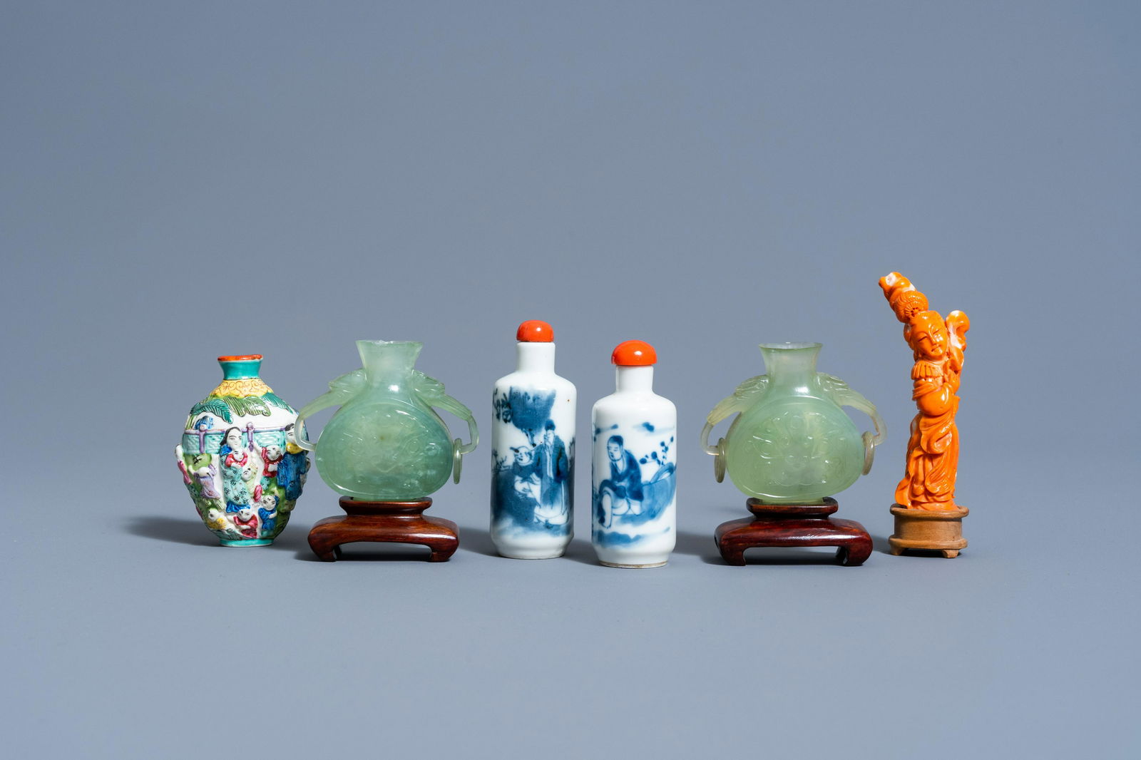 A Chinese carved red coral figure of a lady on a wood (1 of 7)