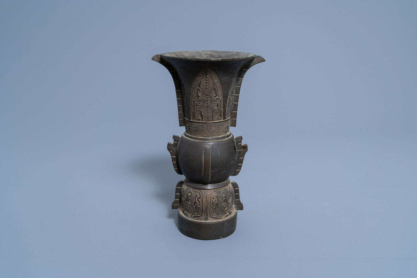 A Chinese bronze 'gu' vase, 19th/20th C. (1 of 7)