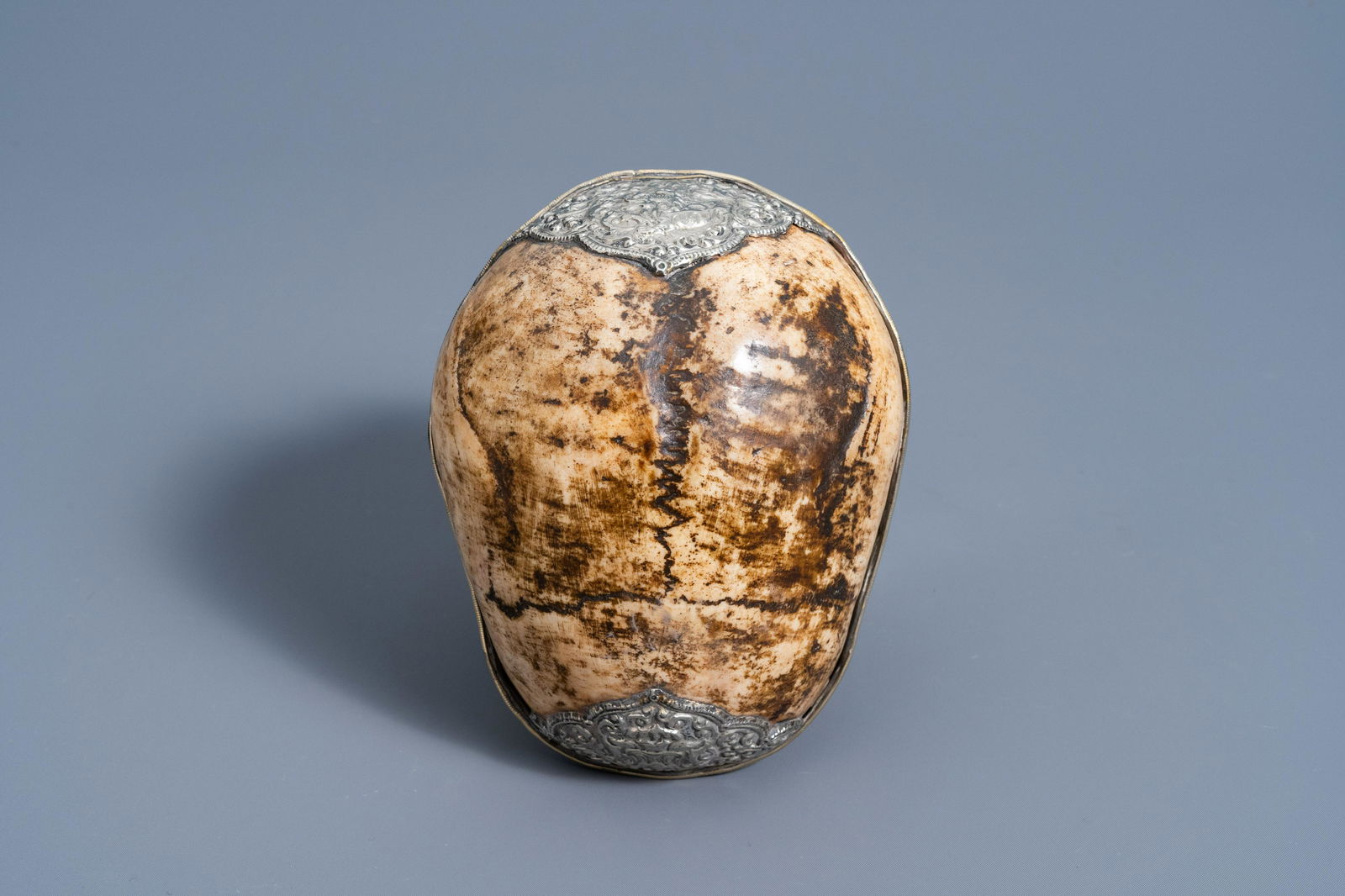 A Tibetan silver mounted kapala or scull cup, first (1 of 8)