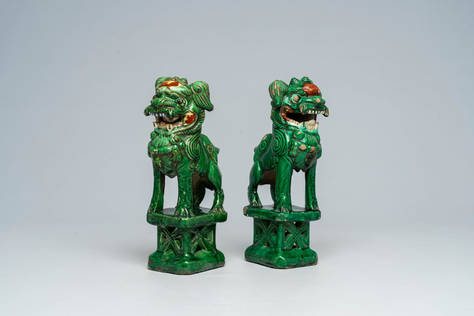Two Chinese green-glazed earthenware temple lions, 18th/19th C (1 of 8)