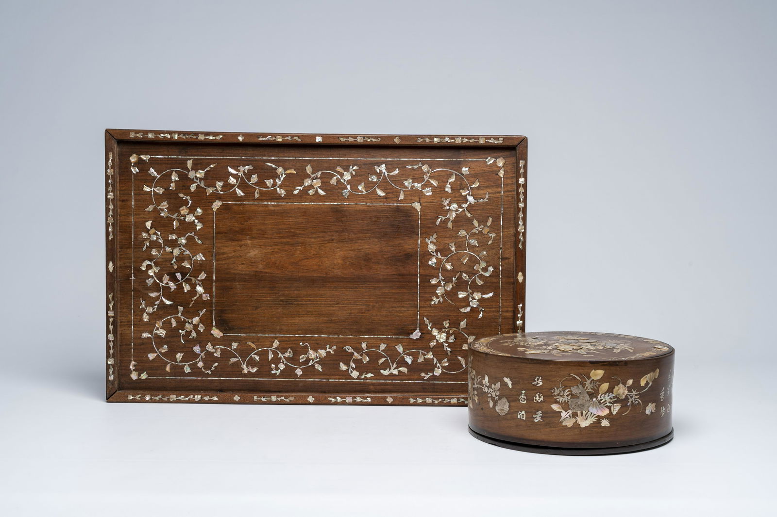 A large Chinese mother of pearl-inlaid wooden tray and a box and cover, 19th/20th C. (1 of 12)