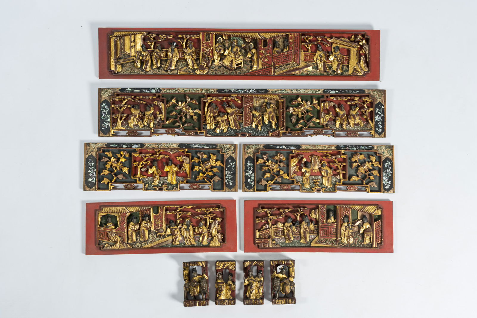 Six Chinese lacquered and gilt wood panels and four fragments with figures in a landscape, 19th/20th (1 of 6)