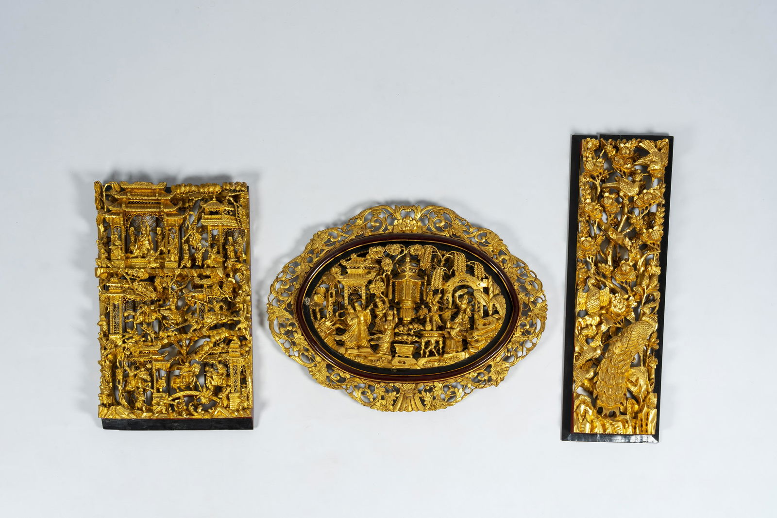 Three Chinese gilt reticulated carved wood panels with birds, palace and warrior scenes, 19th/20th (1 of 11)