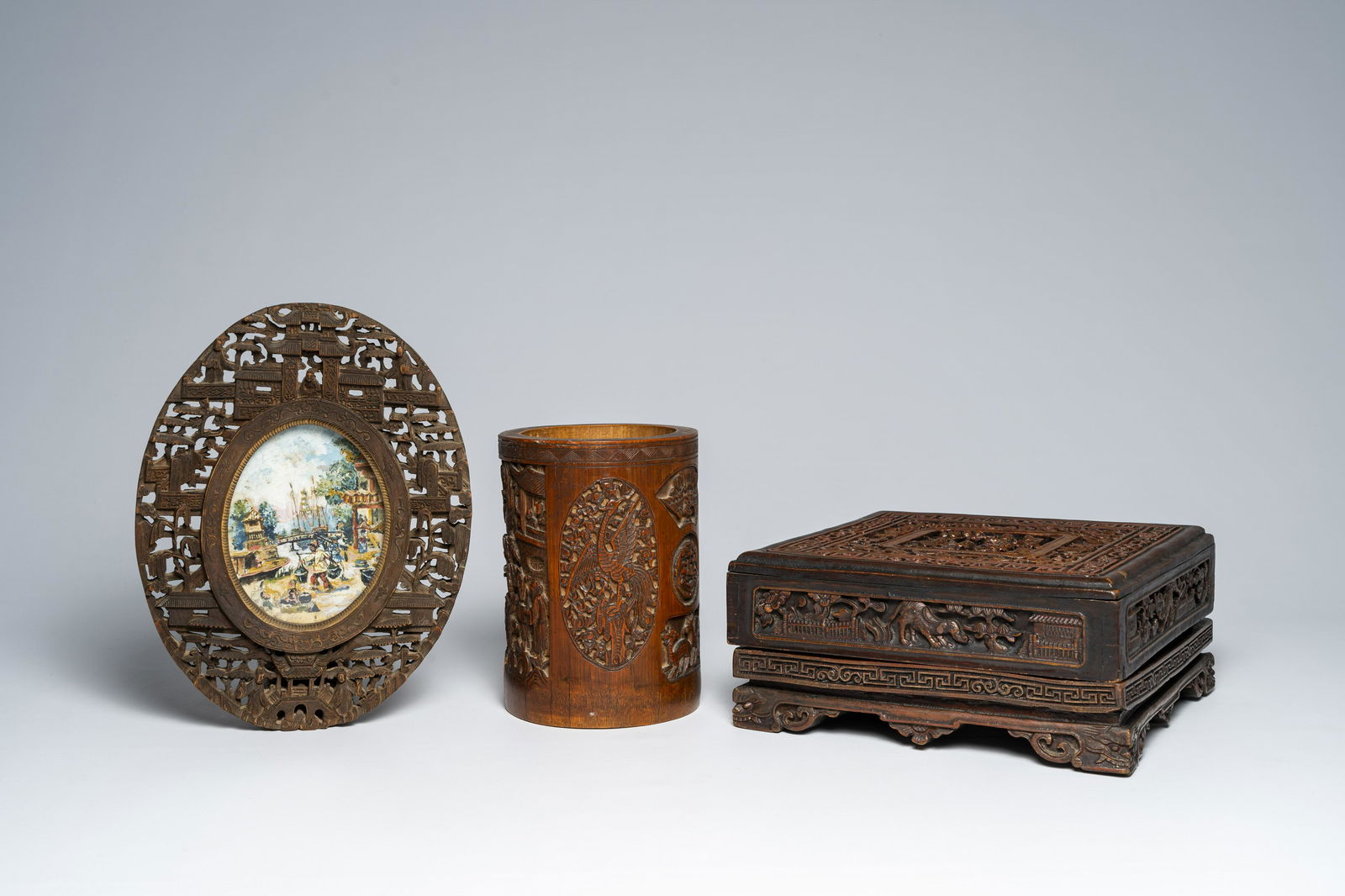 A Chinese Canton carved bamboo brush pot, an open worked wood frame and a wood 'Immortals' box and (1 of 10)