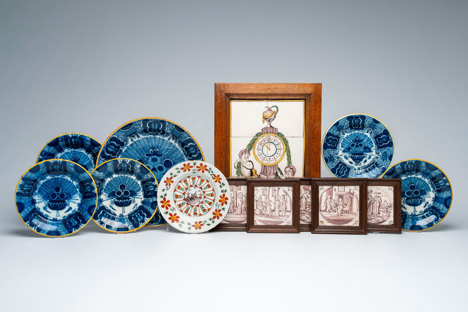 A varied collection of Dutch Delft blue, white and polychrome plates and chargers, manganese tiles (1 of 9)