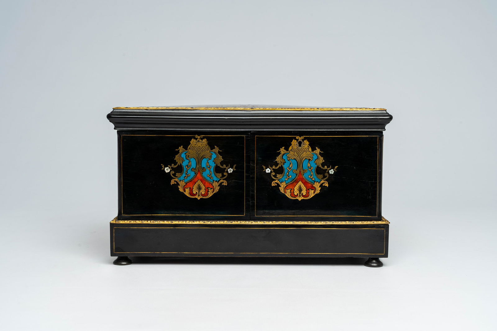 A French Historicism bronze mounted ebonised wooden tortoiseshell, mother-of pearl and brass