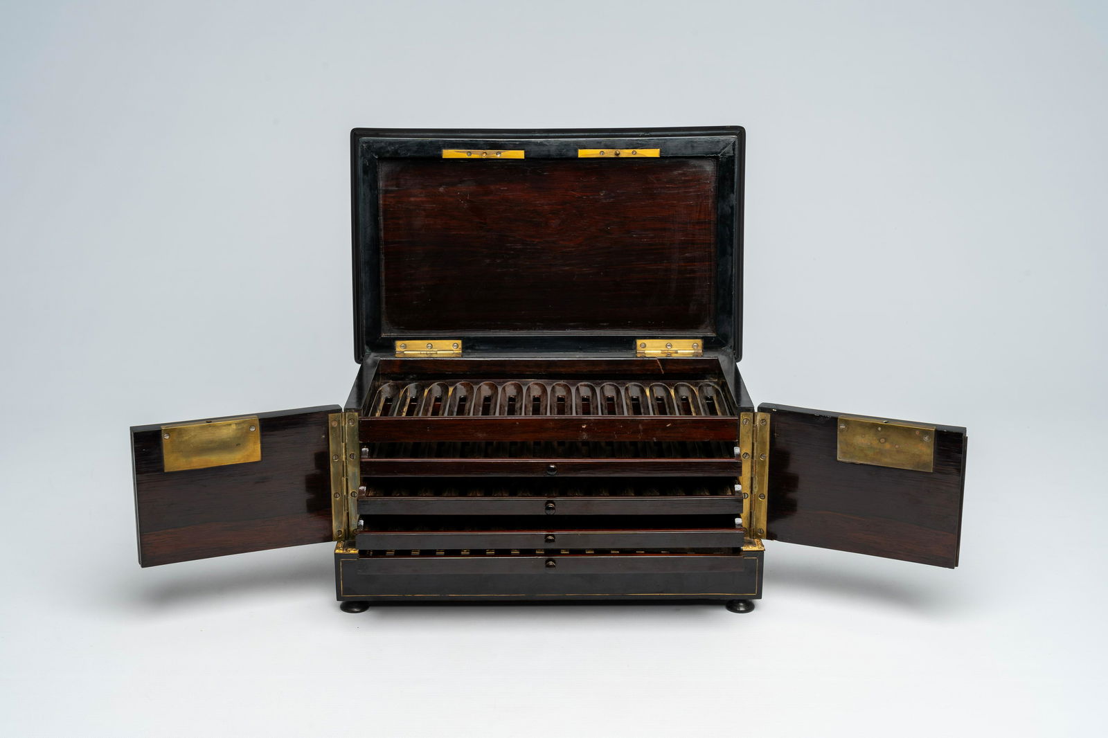 A French Historicism bronze mounted ebonised wooden tortoiseshell, mother-of pearl and brass