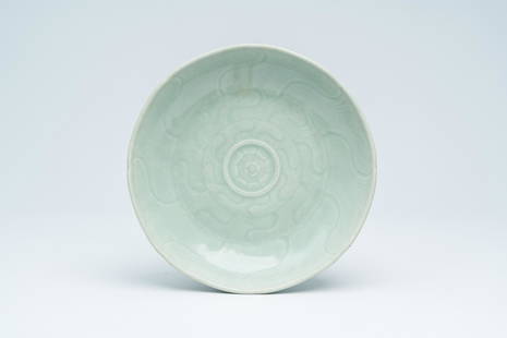 A Chinese celadon-glazed 'lotus' plate, Qianlong/Jiaqing: Full title: A Chinese celadon-glazed 'lotus' plate, Qianlong/Jiaqing Description: Dia.: 23 cm