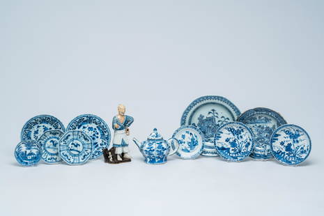 A varied collection of Chinese blue and white porcelain, Kangxi and later: Full title: A varied collection of Chinese blue and white porcelain, Kangxi and later Description: H 17,4 cm (the figure)H 10,5 - L 13,5 cm (the teapot)H 3,7 cm - Dia.: 19,5 cm (the largest saucer