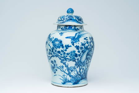 A large Chinese blue and white vase and cover with birds among blossoming branches, Kangxi