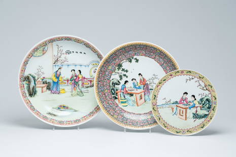 A Chinese famille rose plate and two chargers with figures in a garden, Qianlong marks, 20th C.: Title: A Chinese famille rose plate and two chargers with figures in a garden, Qianlong marks, 20th C. Description: Dia.: 40 - 37,3 - 27 cm