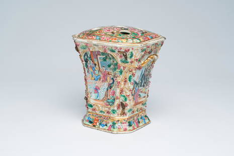 An octagonal Chinese Canton famille rose flower holder with palace scenes and flowers and squirrels: Title: An octagonal Chinese Canton famille rose flower holder with palace scenes and flowers and squirrels in relief, 19th C. Description: H 22,5 cm