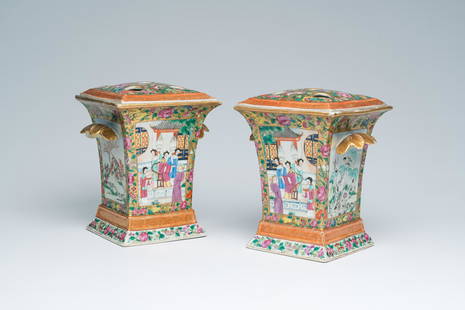 A pair of Chinese Canton famille rose flower holders with palace scenes and birds among blossoming: Title: A pair of Chinese Canton famille rose flower holders with palace scenes and birds among blossoming branches, 19th C. Description: H 22,8 - L 21 - D 16,5 cm