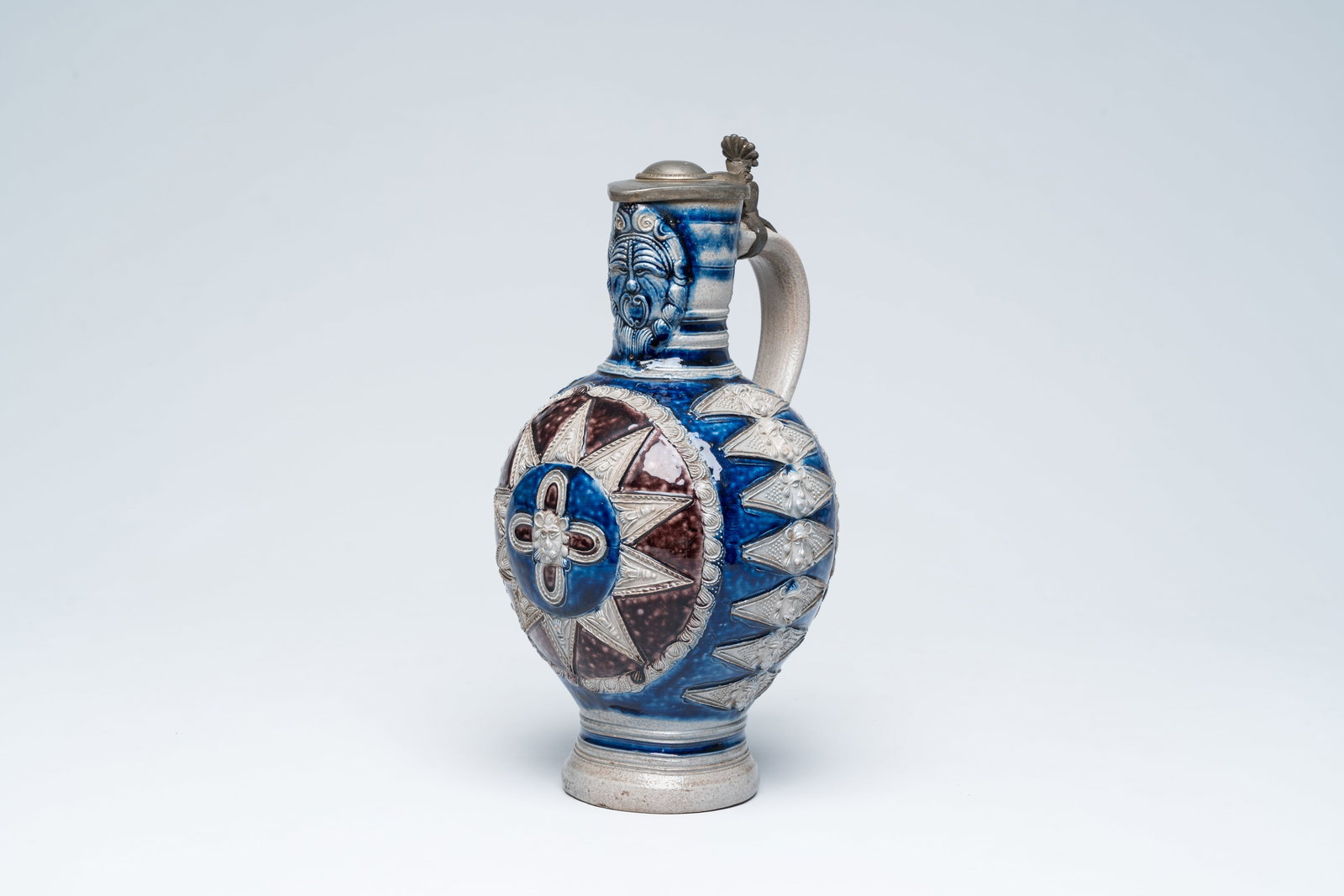 A Westerwald stoneware jug with lion maskes and bees or 'Sternkrug', Germany, second half 17th C. (1 of 8)