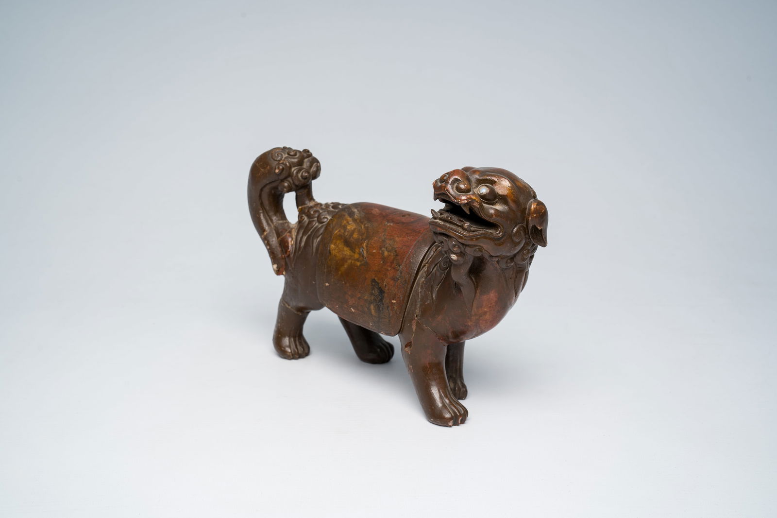 A Chinese soapstone sculpture of a Buddhist lion, 18th C. (1 of 8)