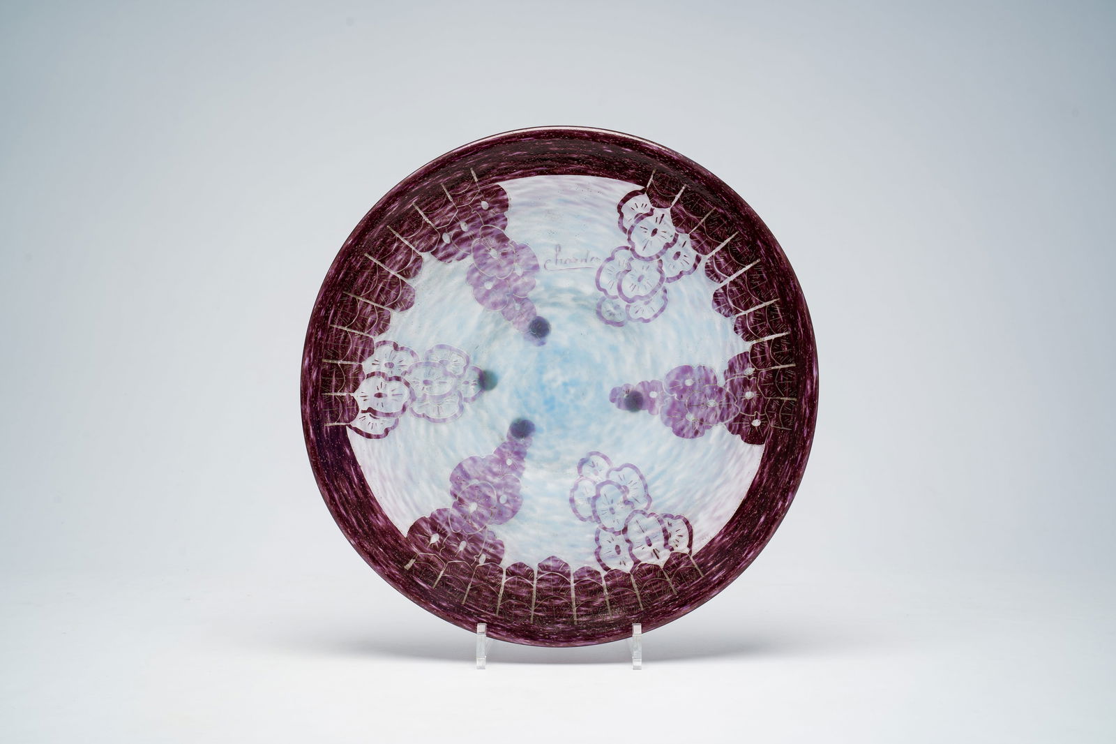 A French Charder (Charles Schneider) Art Deco dish in cameo with 'eglantines' design, first half: Dia.: 35 cm An acid etched cameo glass design in purple overlay over a pate-de-verre frosted ground. Signed Charder in cameo for Charles Schneider. Charles Schneider (1881-1952) was born in Chateau-Th