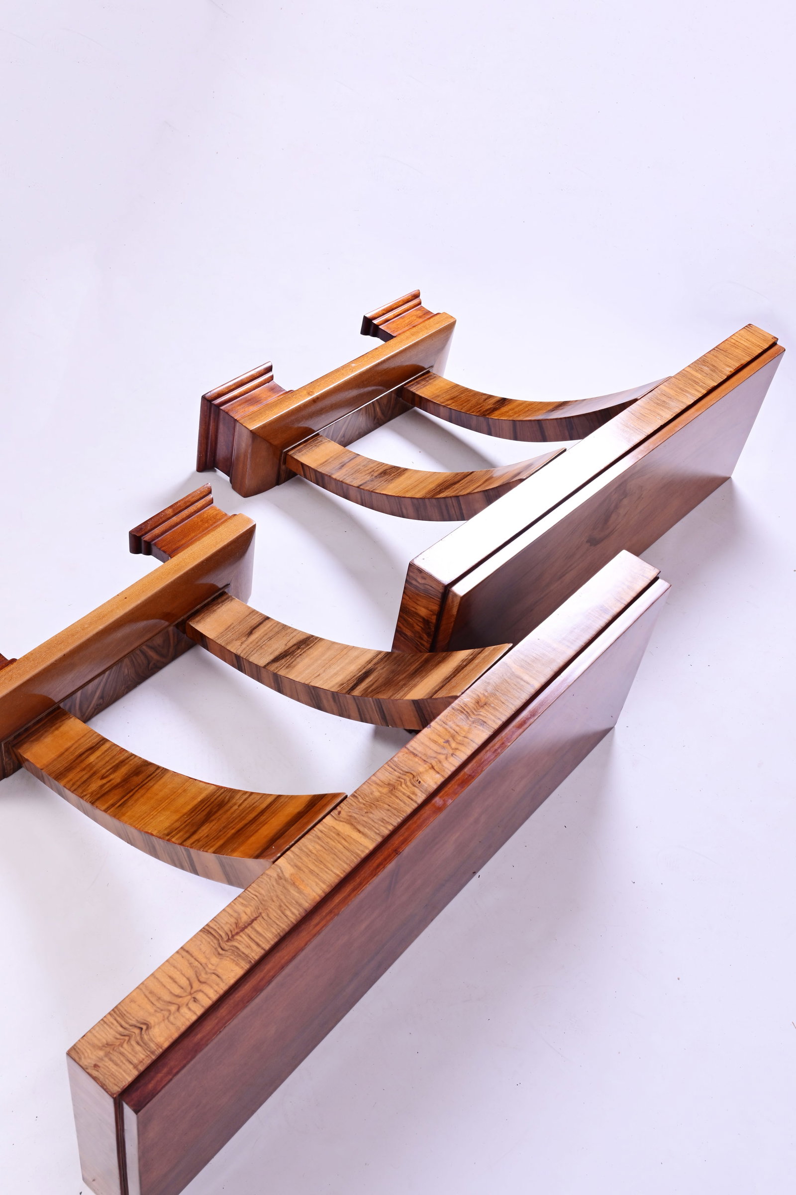 A pair of veneered wooden Art Deco style wall consoles, 20th C.: A pair of veneered wooden Art Deco style wall consoles, 20th C. H ca. 75 - L 100 - D 31 cm