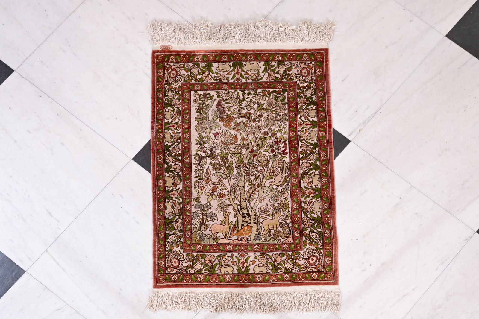 A Turkish Hereke rug with a tree of life in silk and gold thread, signed, 20th C. (1 of 5)