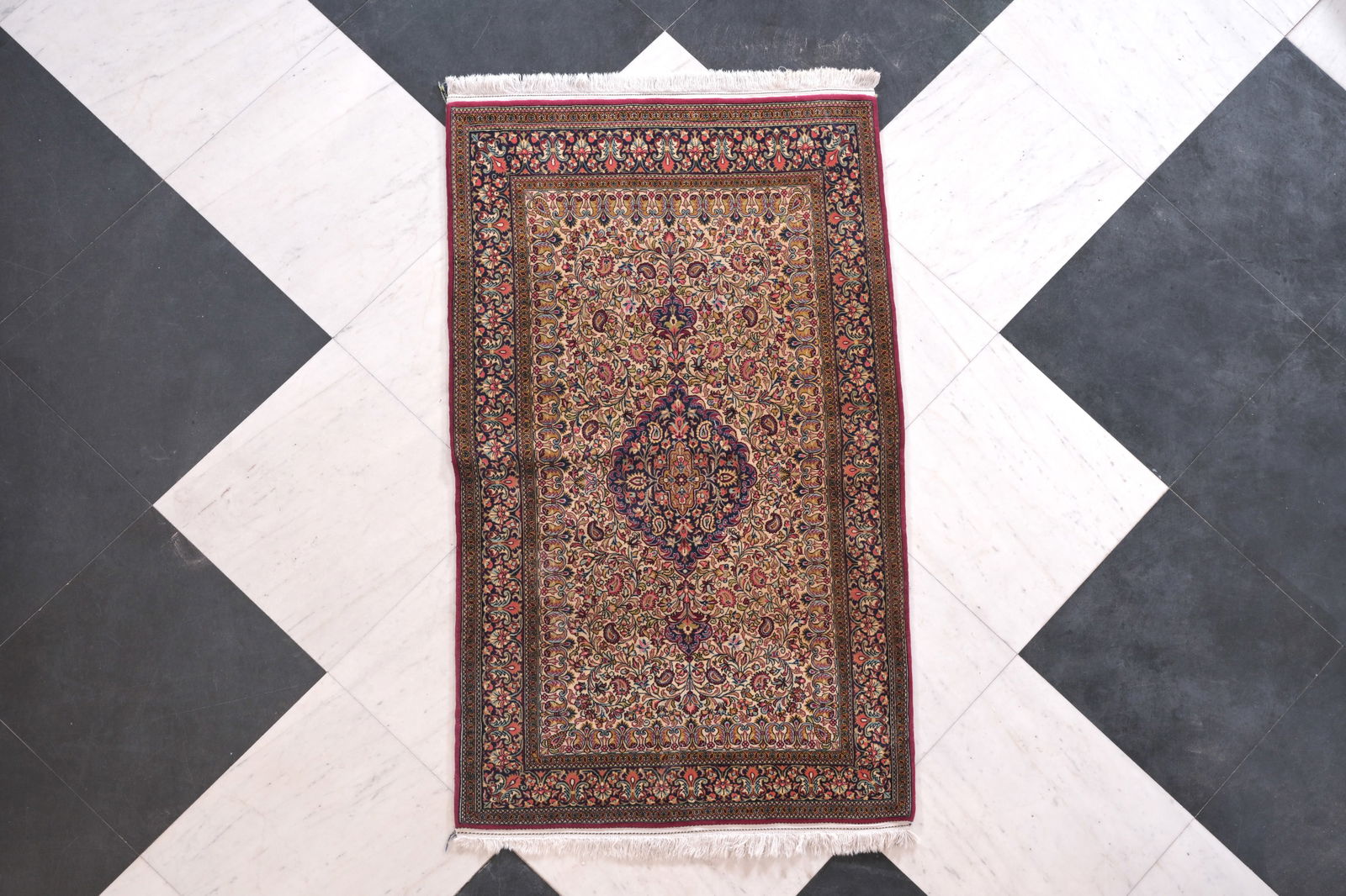 A Persian Qom (Qum/Ghom) rug with floral design, wool on cotton, 20th C. (1 of 9)