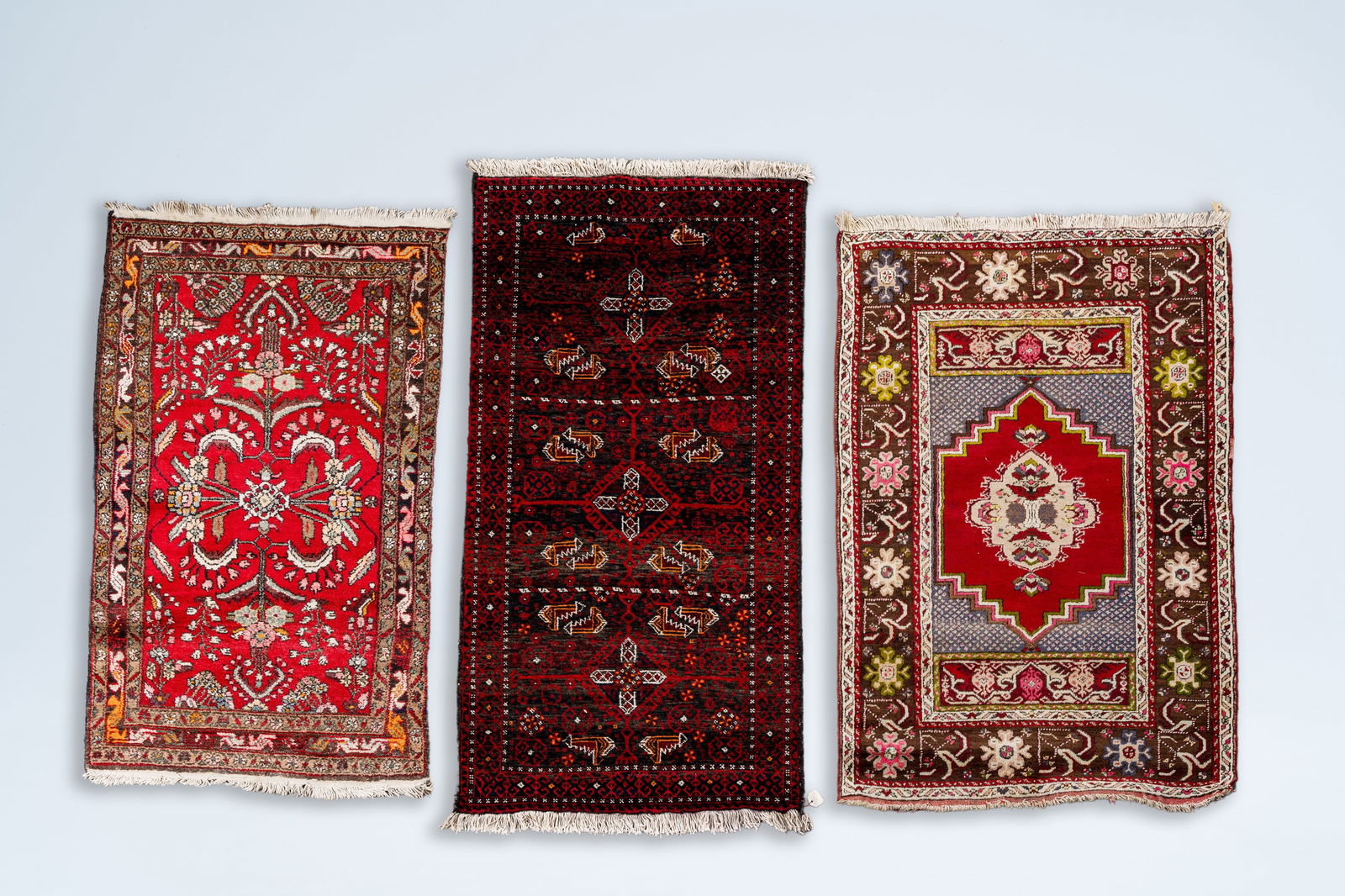 Three Persian Hamadan rugs with geometric and floral design, wool on cotton, 20th C. (1 of 5)