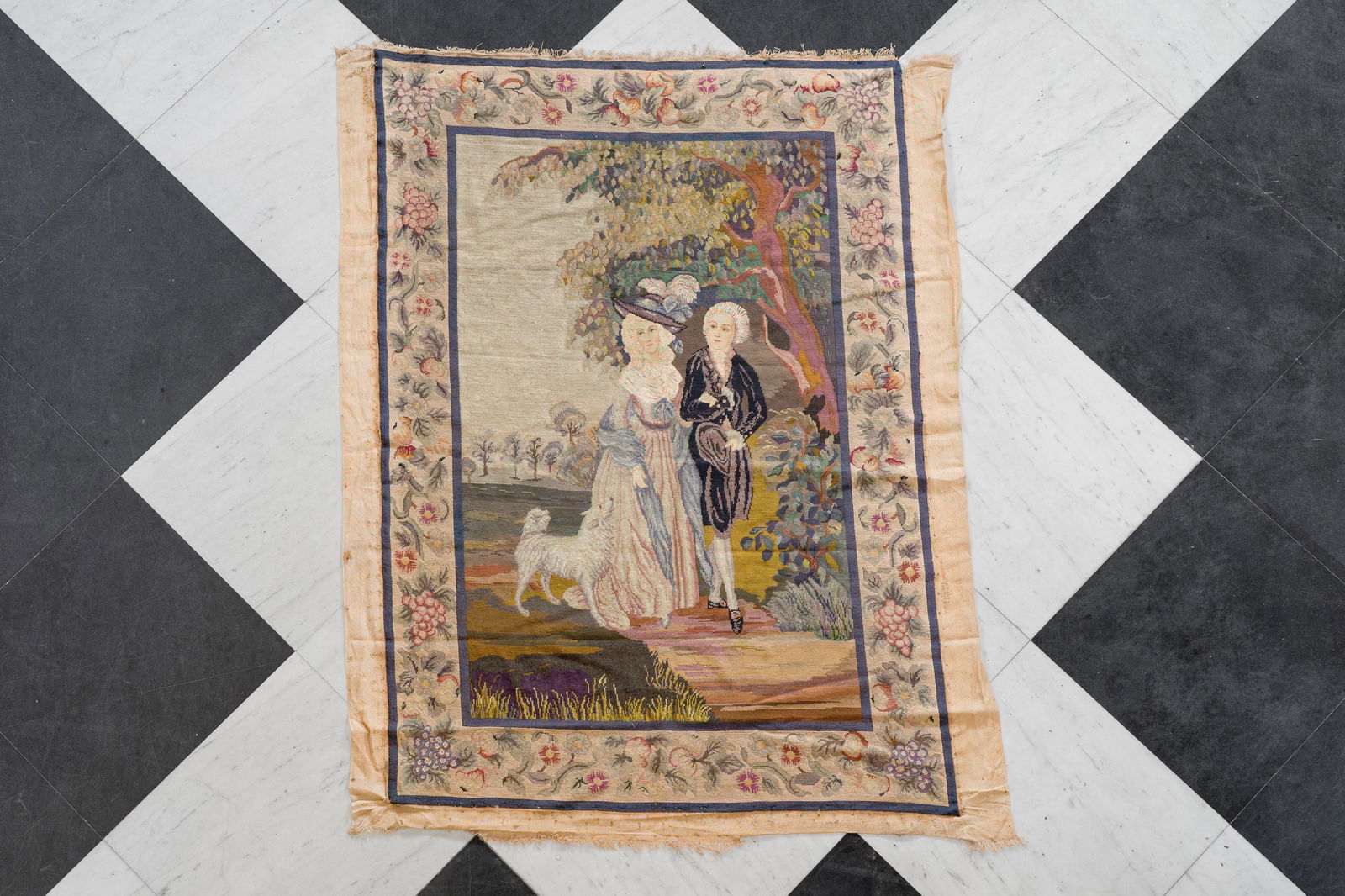 A petit point embroidery with an elegant couple with their dog in a landscape, 19th/20th C. (1 of 6)