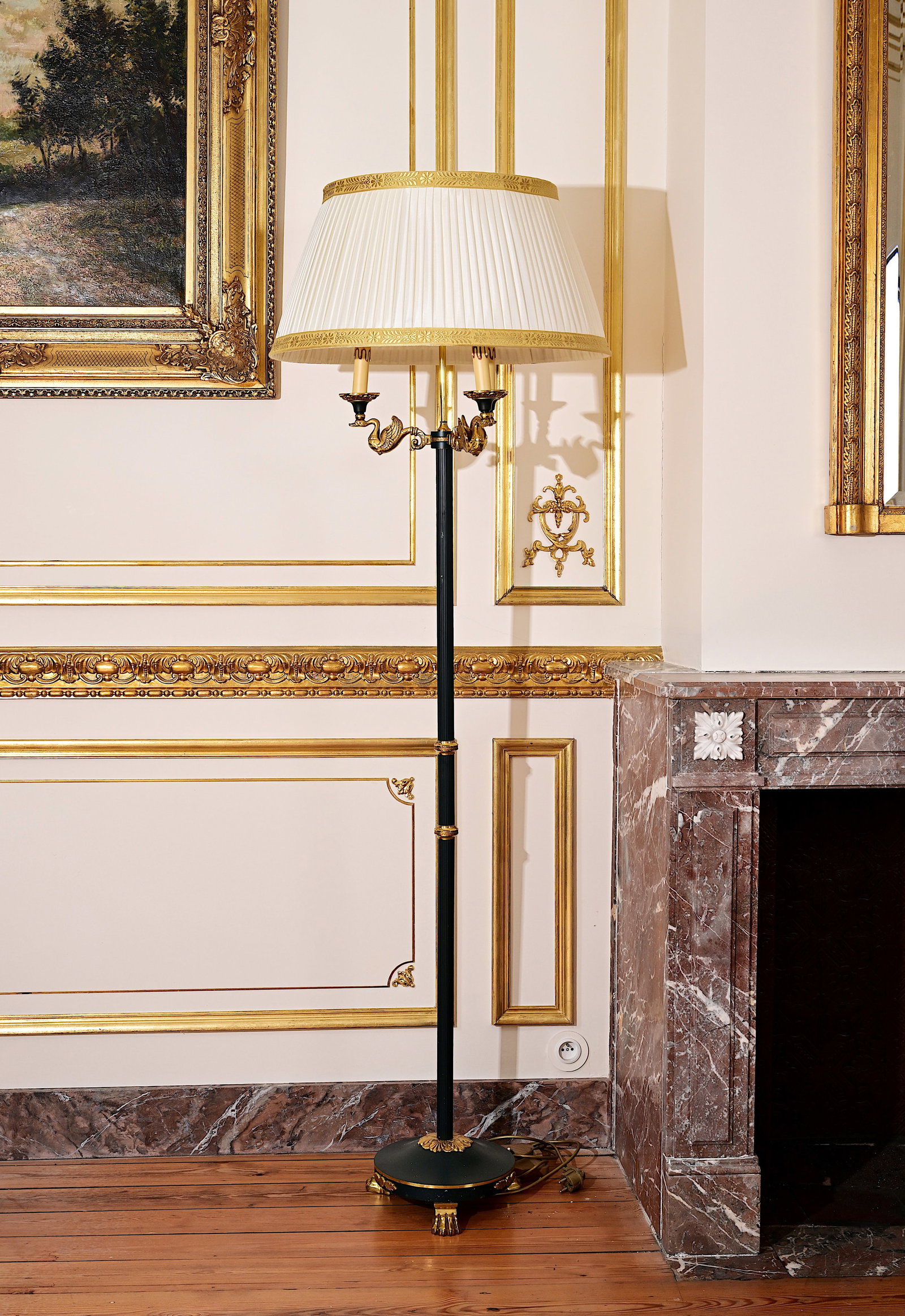 An Empire style floor lamp on three lion paws with three light points carried by swans, 20th C. (1 of 6)