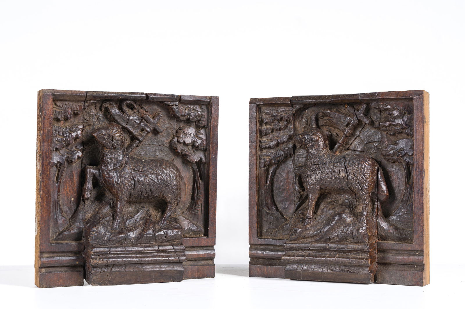 A pair of carved oak 'Agnus Dei' reliefs, probably Flanders, 17th C. (1 of 3)