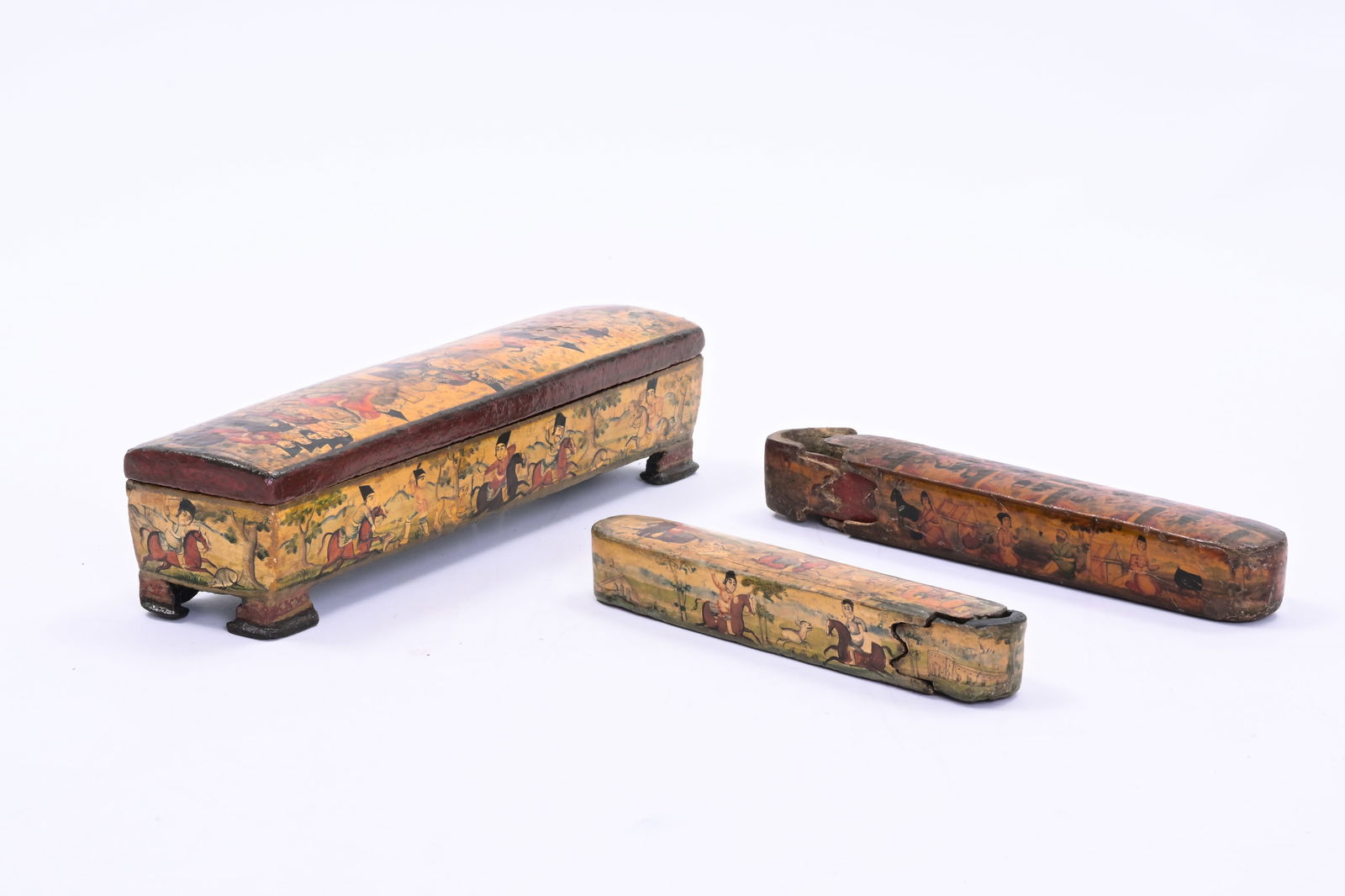 Three lacquered and polychrome decorated papier-mâché qalamdan or pen holders, Qajar, Iran, 19th (1 of 15)