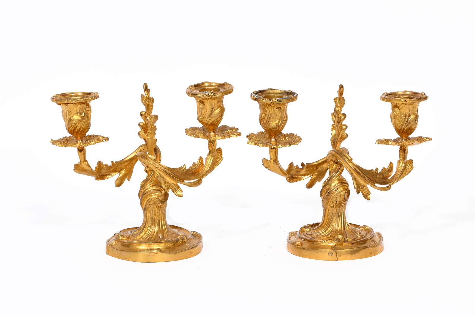 A pair of French gilt bronze Louis XV style two-light candlesticks, 19th/20th C. (1 of 6)