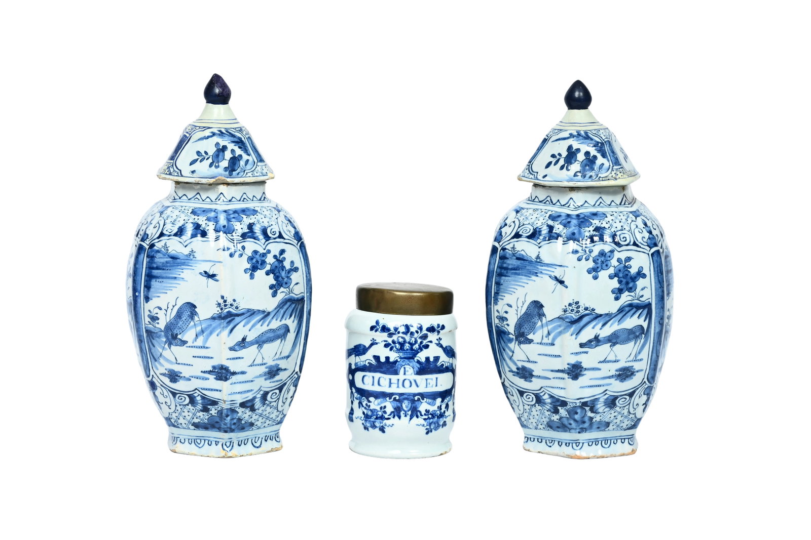 A pair of Dutch Delft blue and white covered vases and a drug jar, 18th C.: A pair of Dutch Delft blue and white covered vases and a drug jar, 18th C. H 27 cm (the vases) H 12 cm (the drug jar)