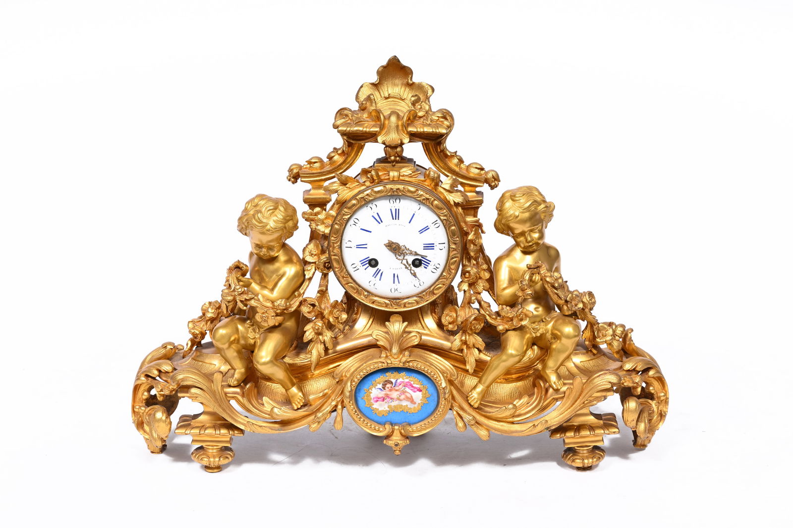 A French gilt bronze mantel clock with two putti and a Sevres style plaque with a bleu celeste (1 of 6)