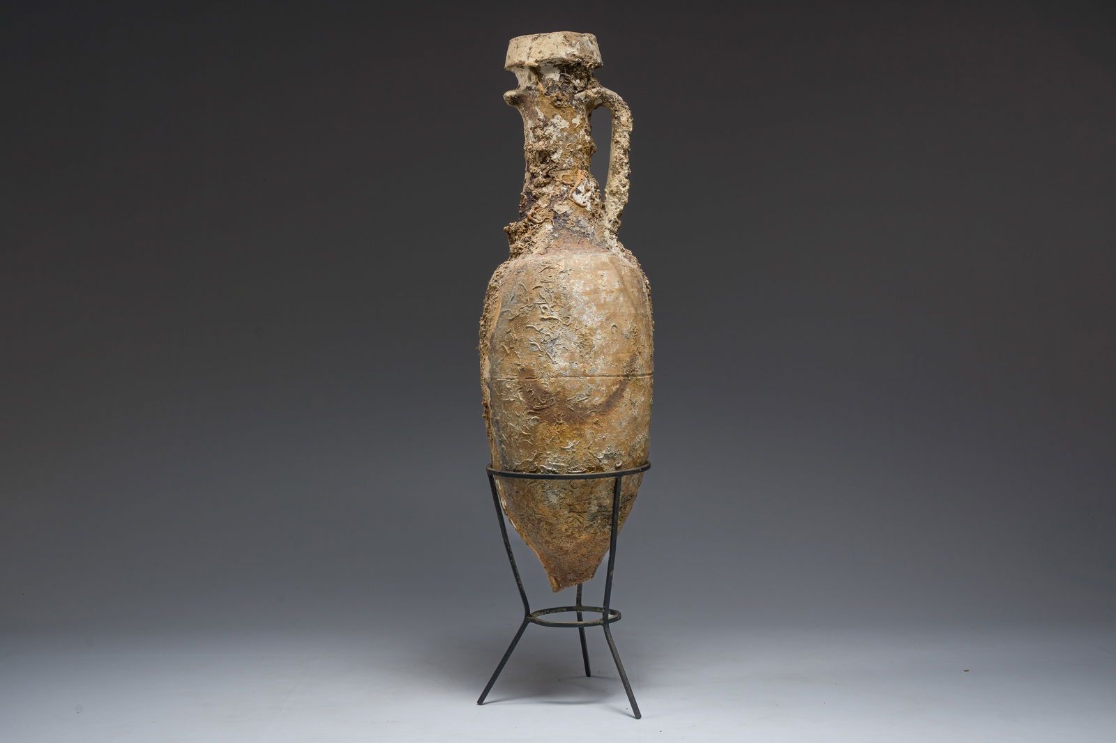A large Roman terracotta oil amphora of the 'Dressel 1' type, 1st-3rd C.: A large Roman terracotta oil amphora of the 'Dressel 1' type, 1st-3rd C. H 114 - 96 cm (with and without base)