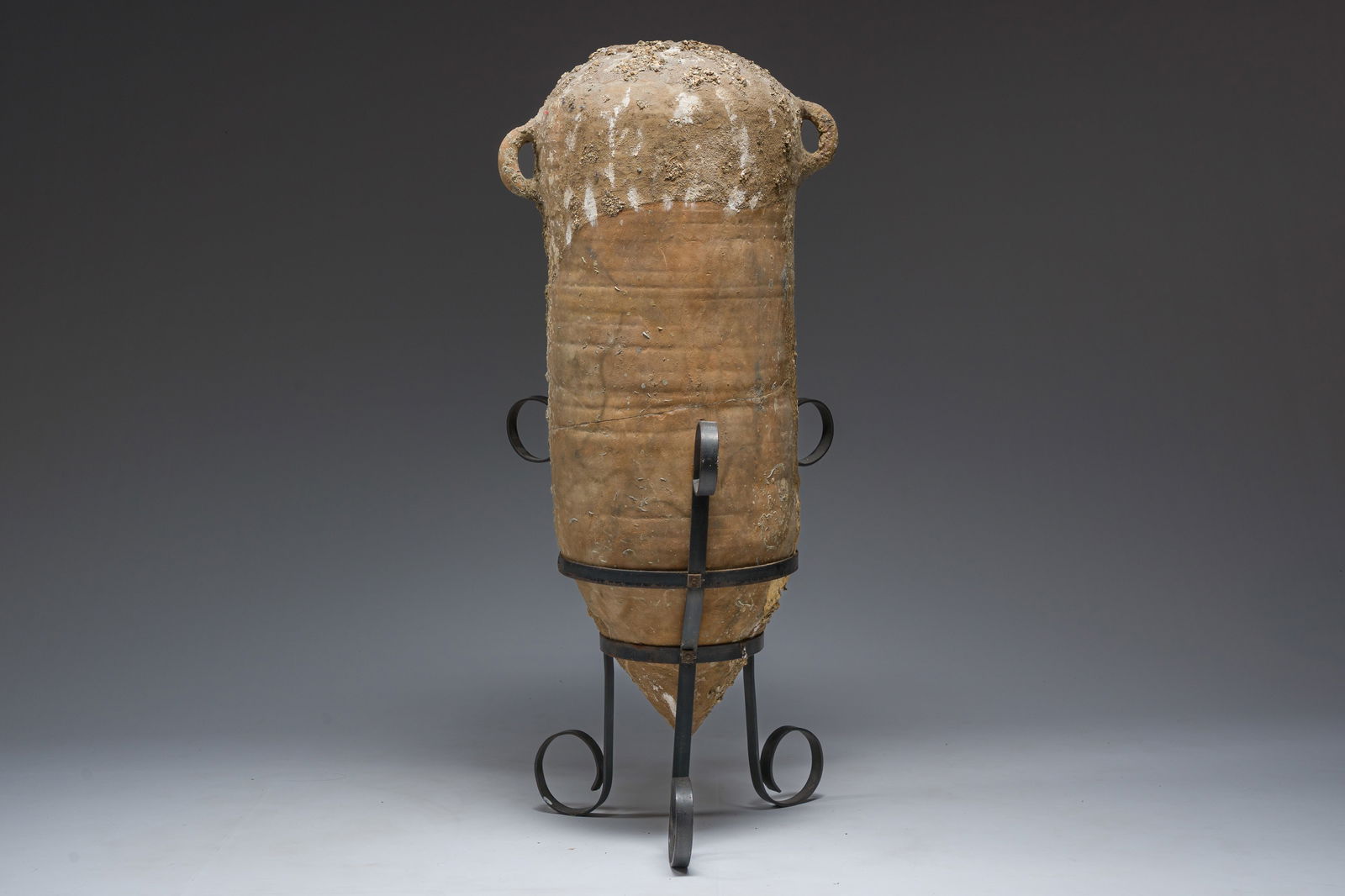 A large Roman terracotta amphora, 1st-3rd C.: A large Roman terracotta amphora, 1st-3rd C. H 95,5 - 85 cm (with and without base)