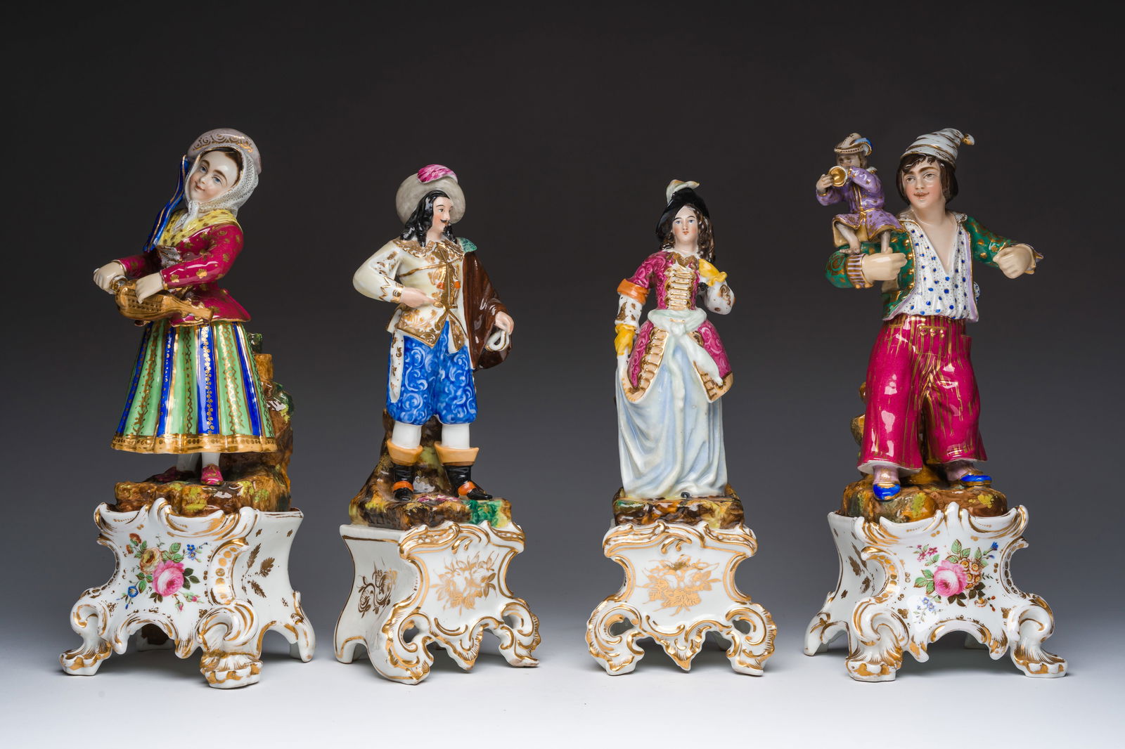 Two pairs of polychrome Paris porcelain figures in the style of Jacob Petit, France, 19th C.: Two pairs of polychrome Paris porcelain figures in the style of Jacob Petit, France, 19th C. H 36,5 - 36 - 33,5 - 33 cm