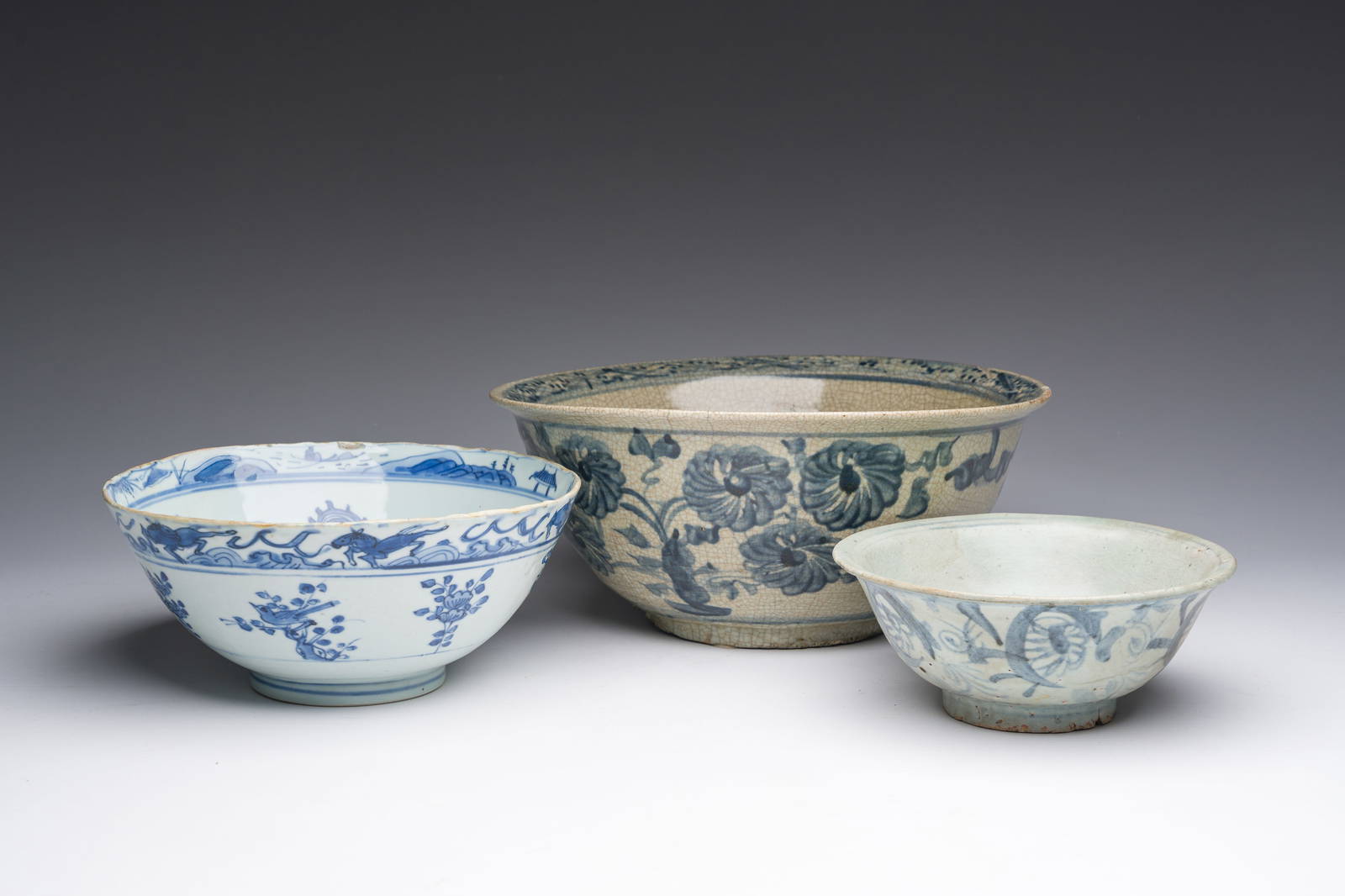 Three Chinese blue and white bowls with floral design, Ming