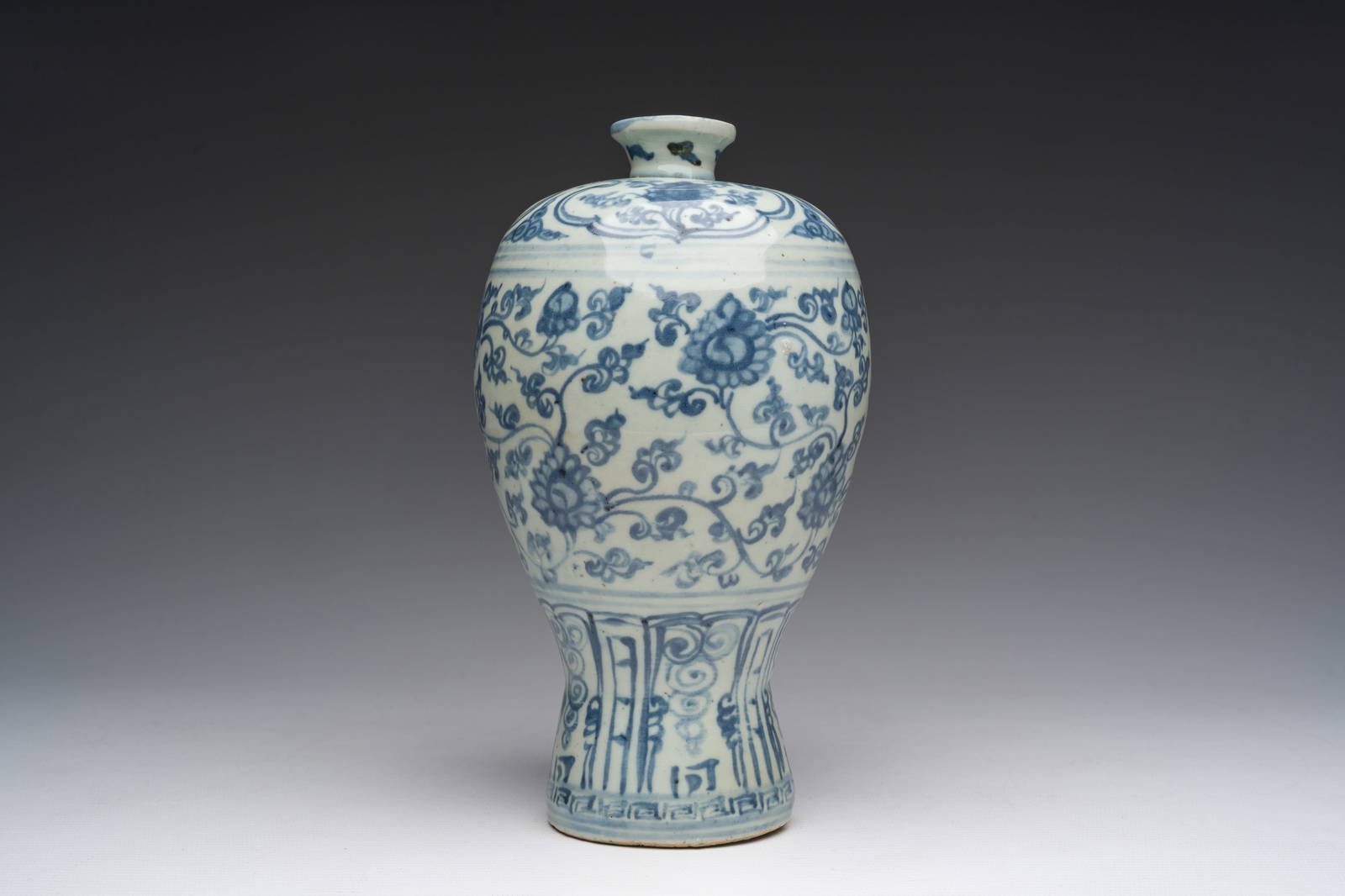 A Chinese blue and white 'lotus scroll' meiping vase, Ming