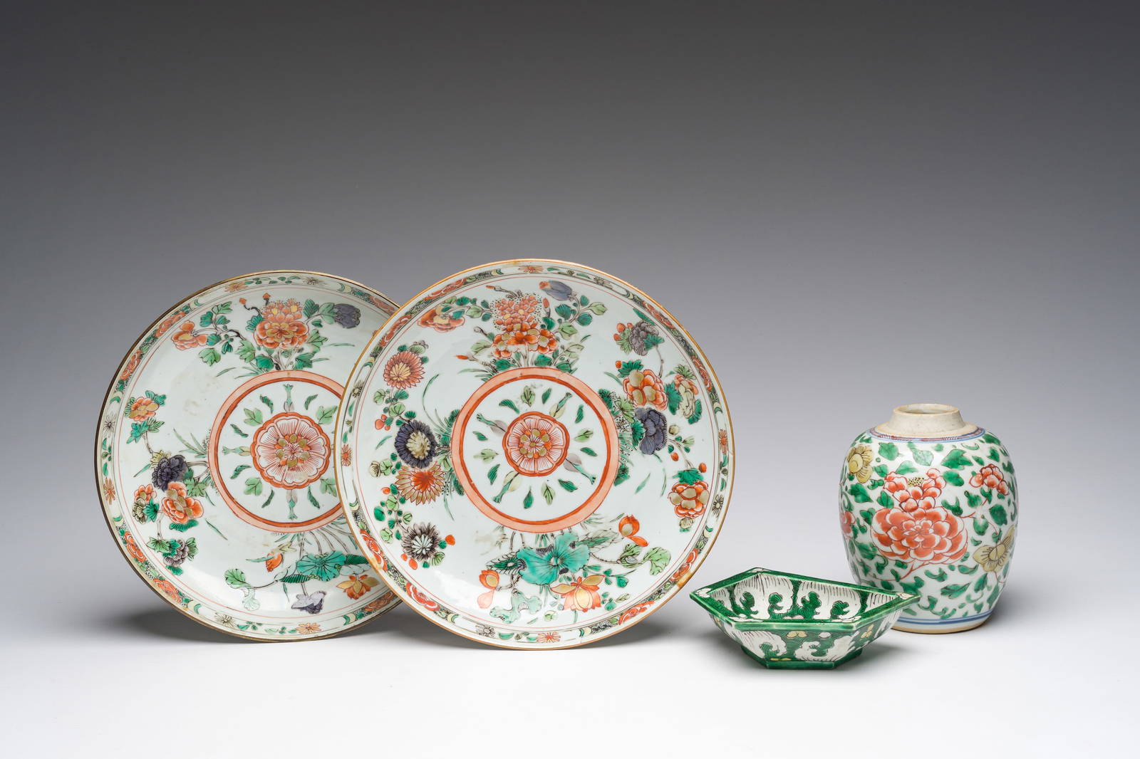 A varied collection of Chinese famille verte porcelain with floral design, Kangxi